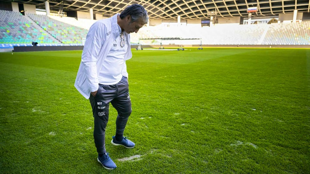 Murat Yakin looks at the turf in the Stožice stadium with worry lines.