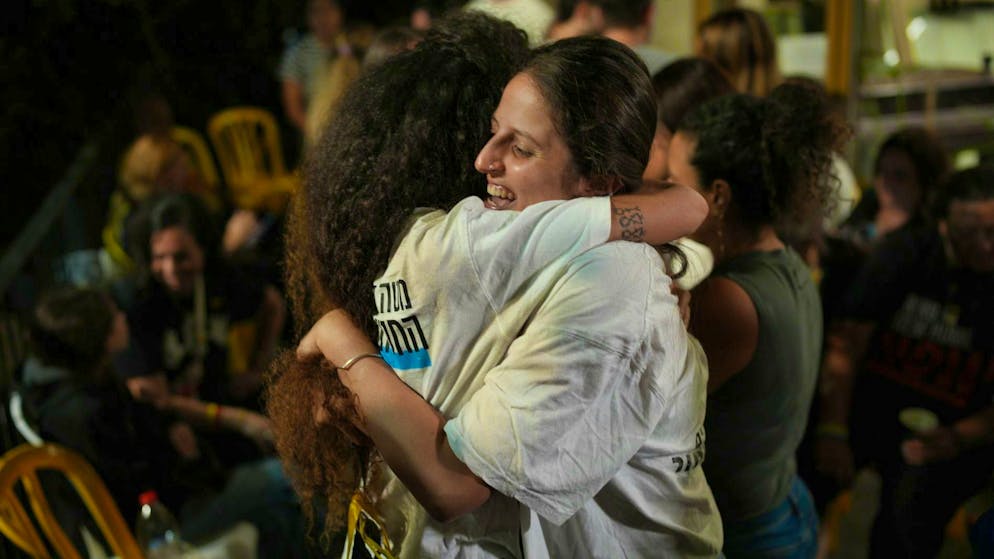 Relatives and supporters of the Israeli Hamas hostages celebrate after the release was announced in Tel Aviv. (October 9, 2025)