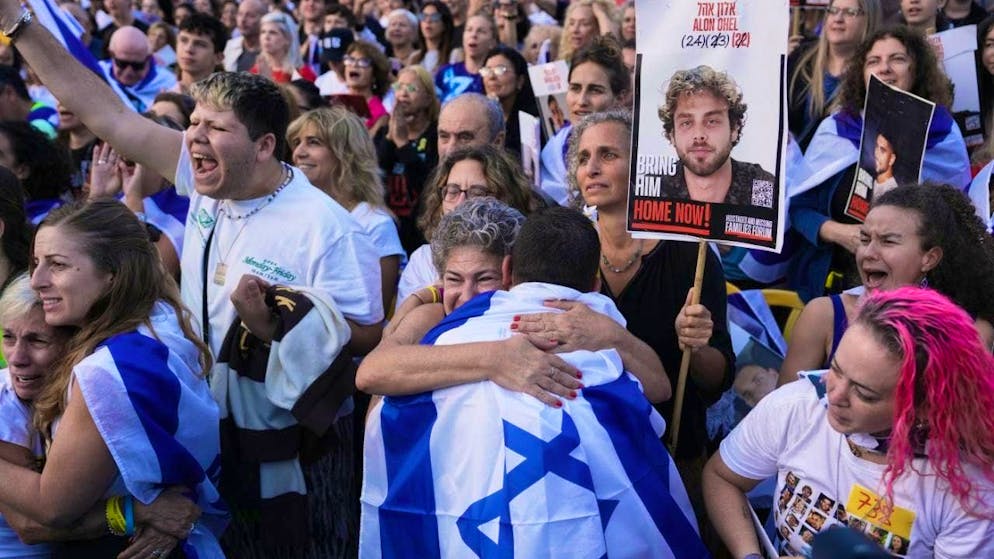 People gather in Hostages Square ahead of the release of Israeli hostages held in the Gaza Strip. Photo: Oded Balilty/AP/dpa