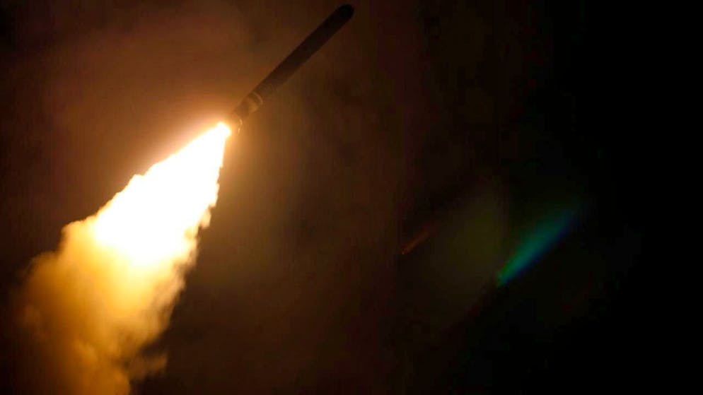 ARCHIVE - In this image provided by the U.S. Navy, the guided-missile destroyer USS Laboon (DDG 58) fires a Tomahawk land-based missile as part of the military response to the use of chemical weapons in Syria on April 7. Photo: Mass Communication Spc. 3rd Clas/U.S. Navy/dpa