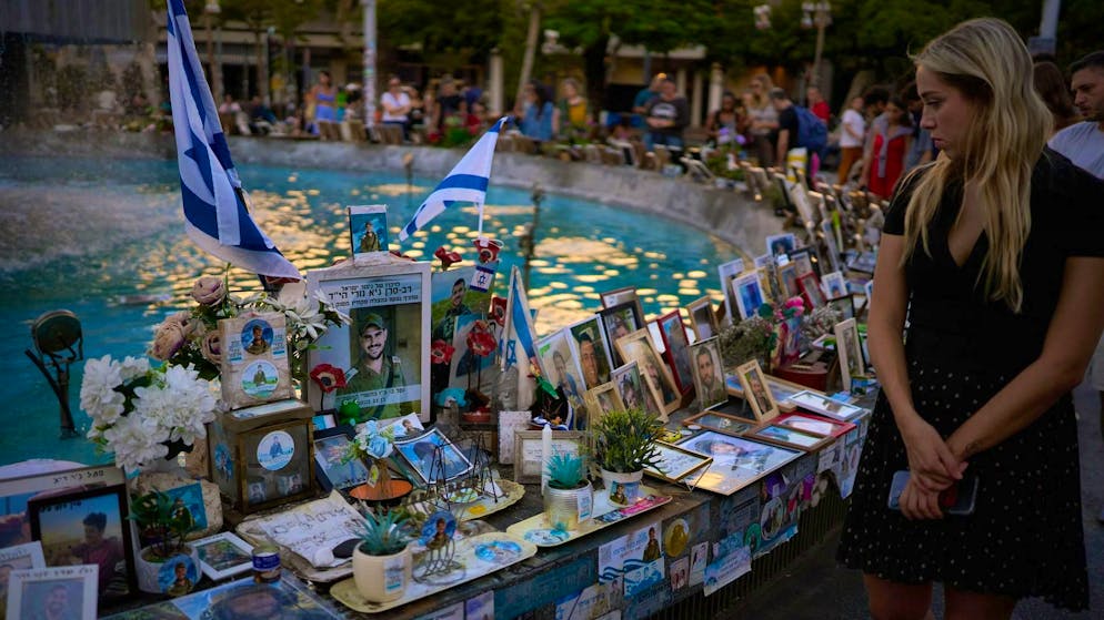 Photos of victims of the terrorist attack on October 7, 2023 at a memorial service in Tel Aviv on October 7, 2025.