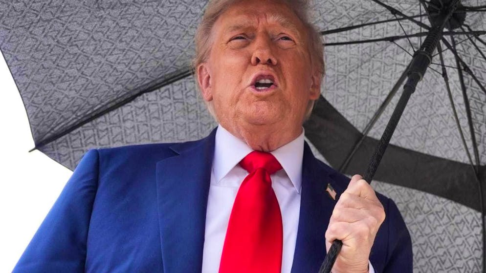 US President Donald Trump speaks to reporters before boarding Air Force One at Joint Base Andrews, Md. to travel to the Middle East. Photo: Evan Vucci/AP/dpa