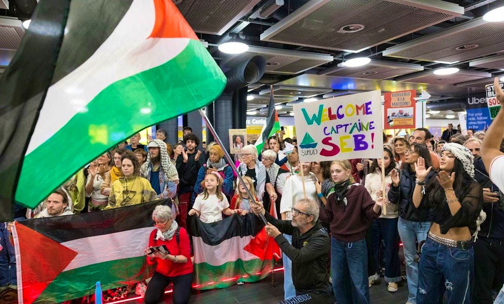 A support committee is awaiting the arrival of nine Swiss nationals who took part in the humanitarian flotilla for Gaza, the "Global Sumud Flotilla", at Geneva Airport this Sunday, October 5, 2025.