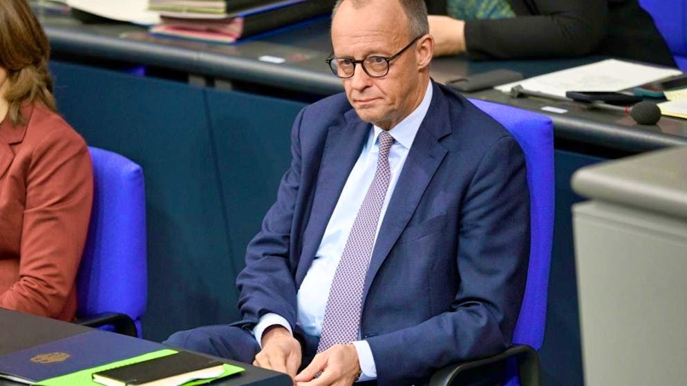 Federal Chancellor Friedrich Merz (CDU) sits after his speech in the Bundestag. Photo: Niklas Graeber/dpa
