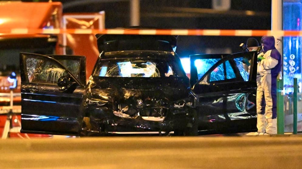 ARCHIVE - Forensics officers work on a car that was driven into a crowd of people at the Christmas market in Magdeburg. Photo: Hendrik Schmidt/dpa