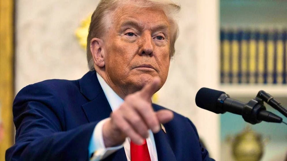 US President Donald Trump gestures in the Oval Office of the White House. Photo: Alex Brandon/AP/dpa