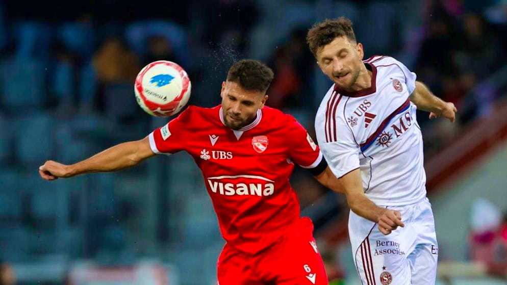 Usually one step quicker: Thun with Leonardo Bertone (left), who continue to amaze promoted teams, also sent Servette (Miroslav Stevanovic) home with a defeat