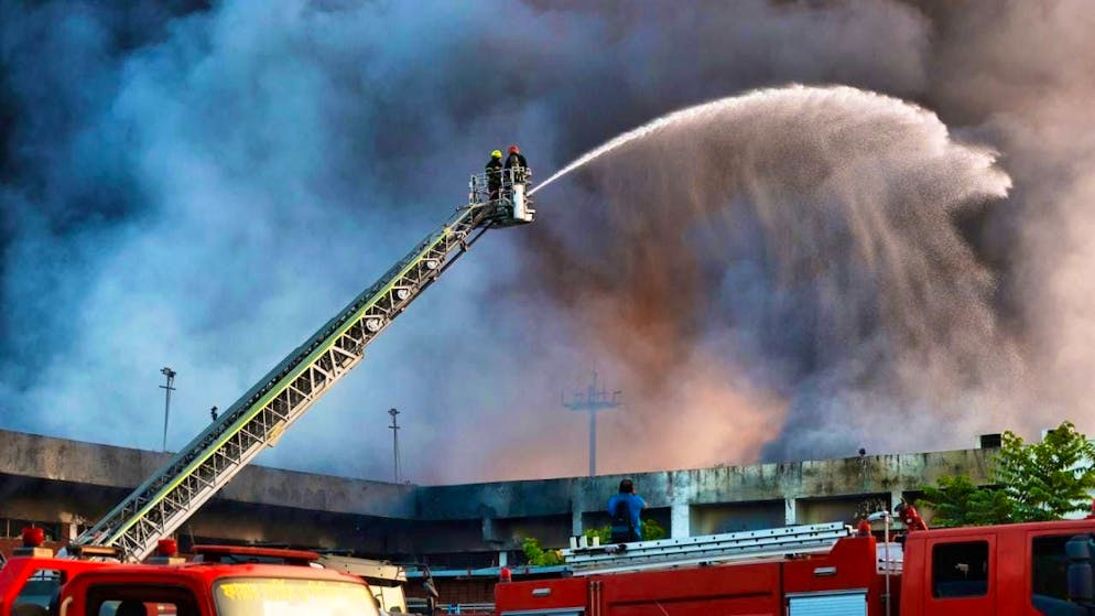 Firefighters fighting the blaze on Saturday.