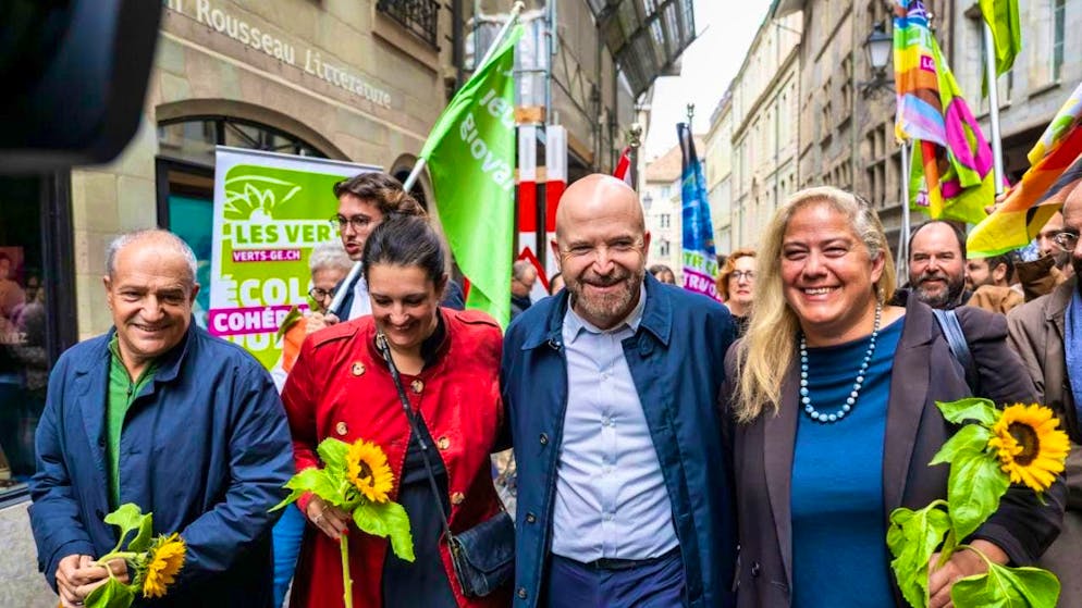 Nicolas Walder accompanied by Green and SP supporters after the first round of voting.