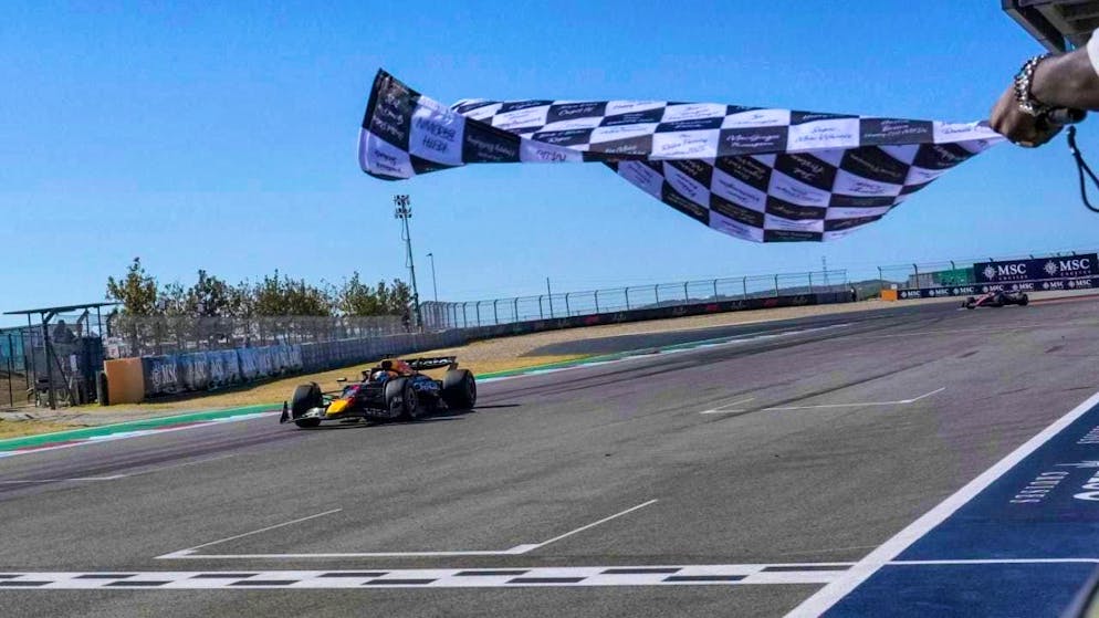 Max Verstappen celebrates a start-finish victory in the US GP