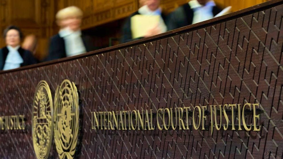 Judges take their seats before reading out the International Court of Justice's opinion on what Israel must do to ensure humanitarian aid reaches Palestinians in Gaza and the occupied West Bank. Photo: Peter Dejong/AP/dpa