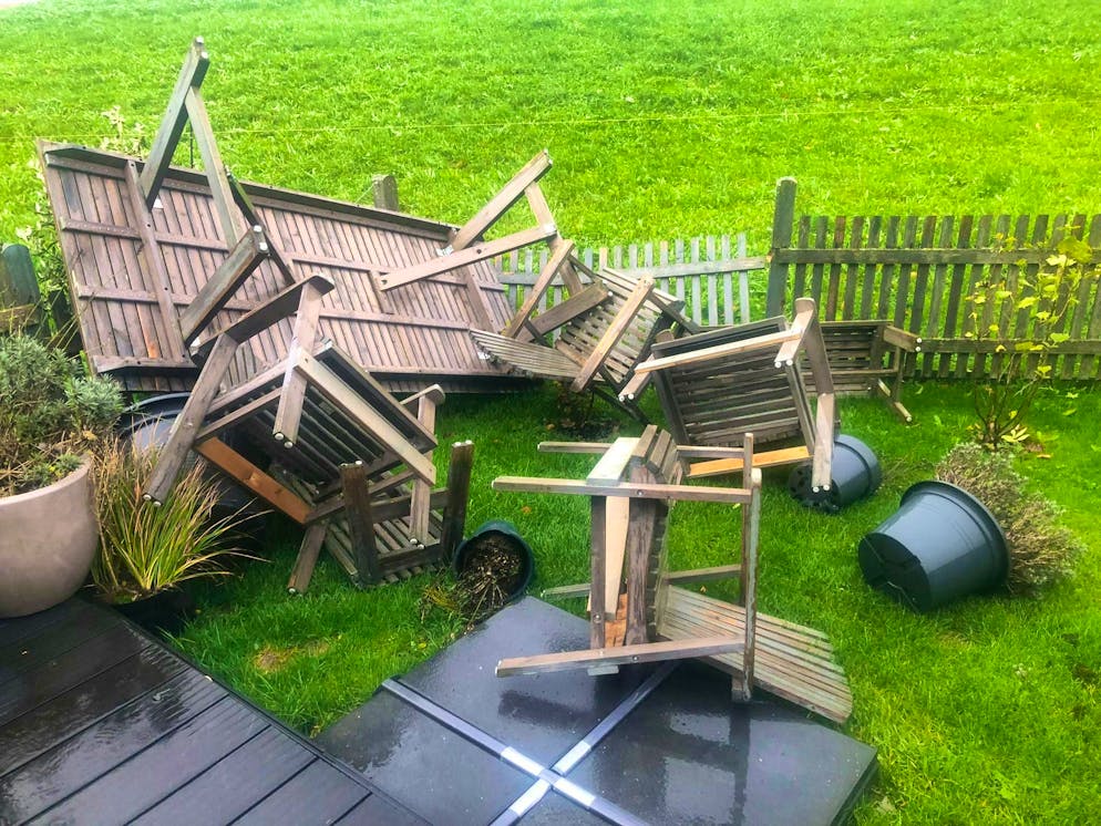 Benjamin. In the garden, the furniture caused the fence to collapse.