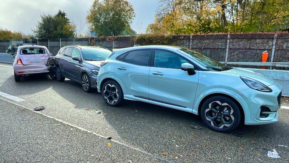 Three of the five cars involved. 