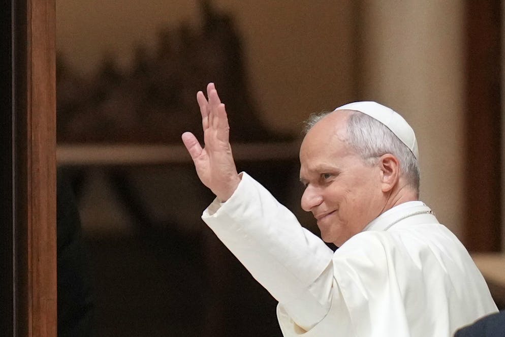Pope Leo XIV leaves at the end of an audience with the participants in the Jubilee of the Synodal Teams and Participation Bodies in the Paul VI Hall, at the Vatican, Friday, Oct. 24, 2025. (AP Photo/Alessandra Tarantino)