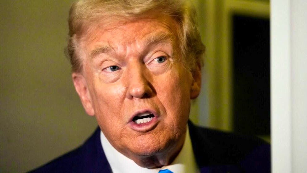 ARCHIVE - US President Donald Trump speaks to reporters aboard Air Force One at Al Udeid Air Base. Photo: Mark Schiefelbein/AP/dpa