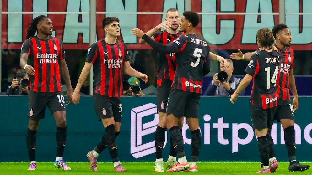 Mian celebrates the winning goal by Strahinja Pavlovic (center).