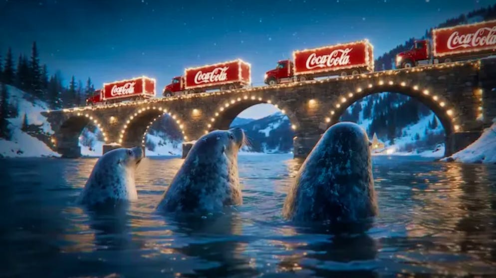 KI-Robben beobachten die vorbeifahrenden Coca-Cola-Trucks.