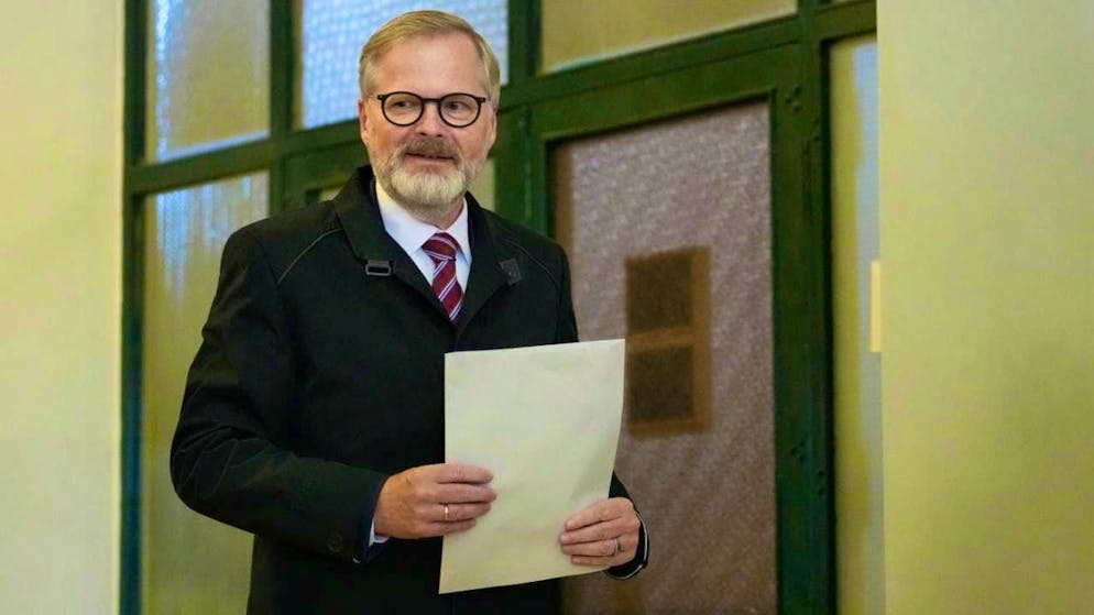 ARCHIVE - The Czech head of government Petr Fiala casts his vote in the parliamentary elections at a polling station. Following the defeat of his liberal-conservative coalition, his cabinet has now announced its resignation. Photo: Darko Bandic/AP/dpa