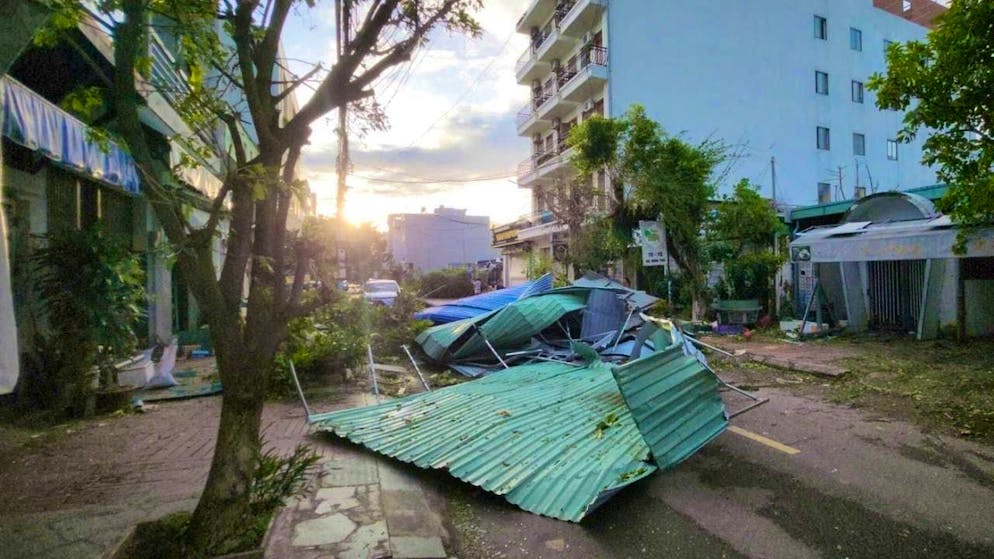 Debris lies on a street in Gai Lai, Vietnam, after Typhoon Kalmaegi hit the country with strong winds and torrential rain. Photo: Sy Thang/Vietnam News Agency/AP/dpa