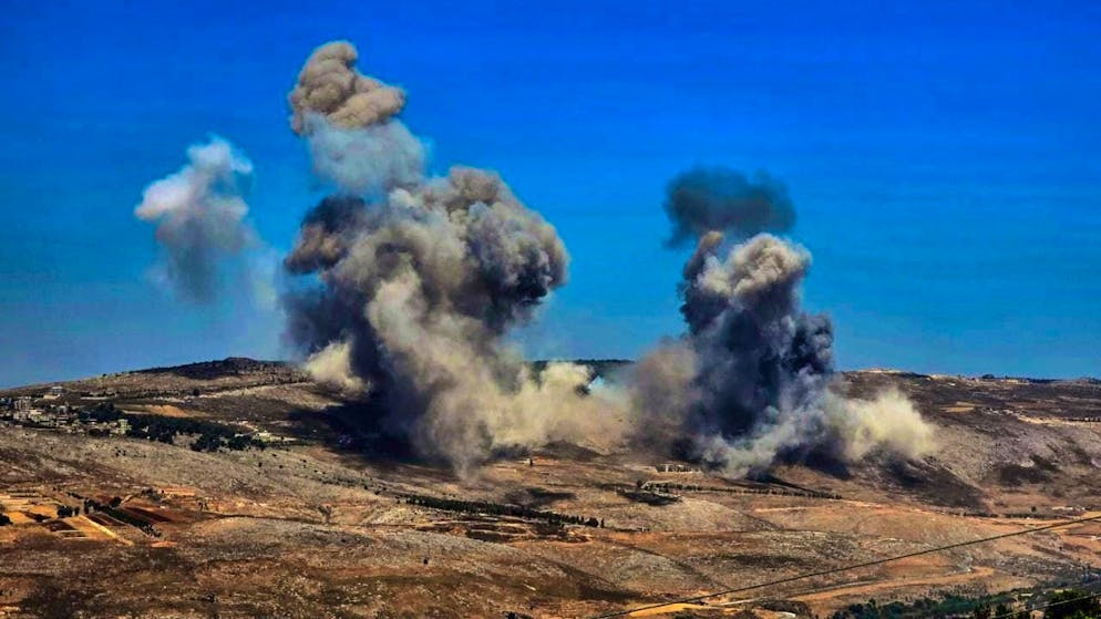ARCHIVE - Smoke billows after Israeli strikes on areas in southern Lebanon, allegedly targeting pro-Iranian Hezbollah positions on the outskirts of the southern Lebanese city of Nabatijeh. Photo: Stringer/dpa