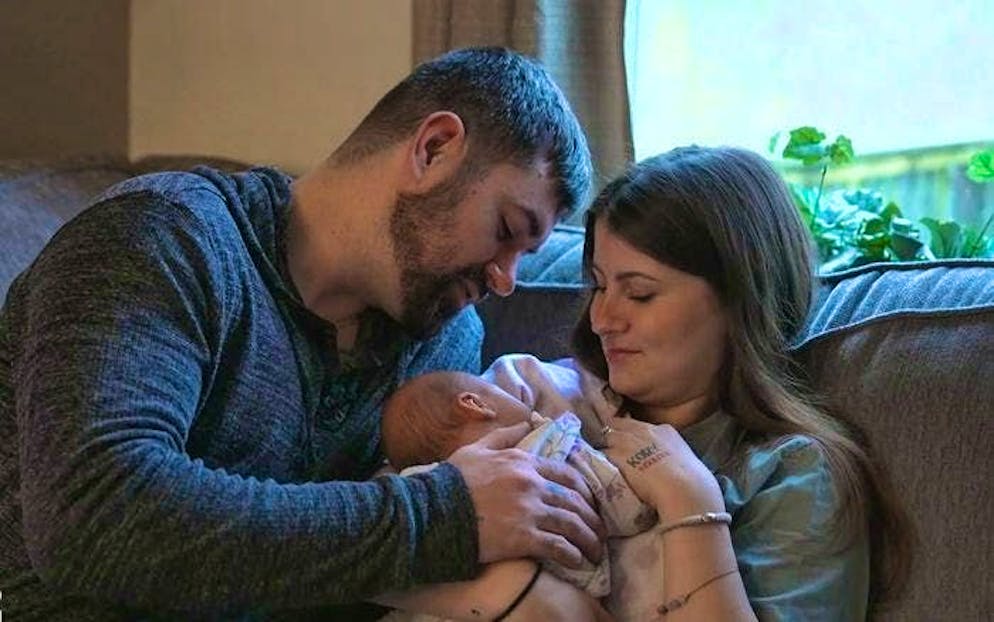 Found each other through a pen pal relationship: TV expat couple Rebecca and Kory with their baby.