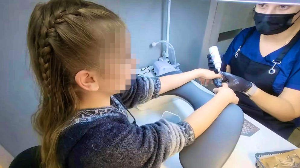 New look: One of the daughters celebrates her twelfth birthday in October and is allowed to have her nails done while her mother is filming.