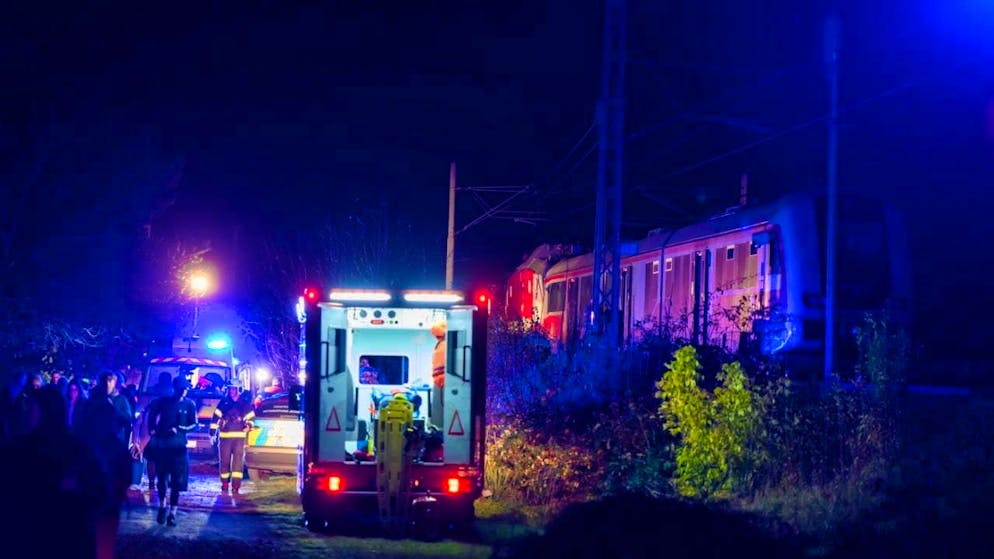 Emergency services are on duty after a train collision. Several dozen people were injured in a collision between two passenger trains in Slovakia on Sunday evening. Photo: Jaroslav Novák/TASR/dpa