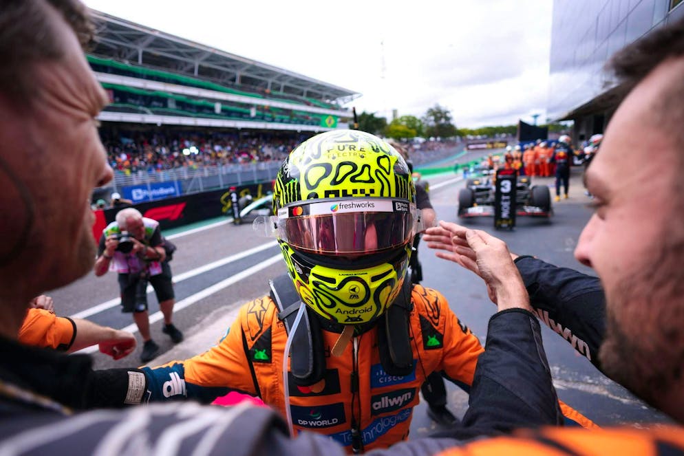Norris races towards World Championship title - Verstappen races to catch up - Gallery. Norris celebrates victory with his team.