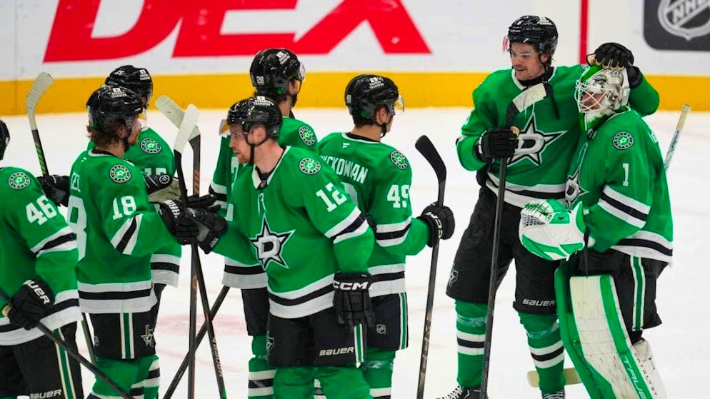 The Dallas Stars with Lian Bichsel (2nd from right) celebrate the latest win against the Seattle Kraken.