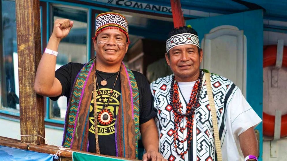 Indigenous activists stand on board the "Amazon Flotilla", with which they traveled over 3000 kilometers on the Amazon River to the World Climate Conference in Brazil. Photo: Larissa Schwedes/dpa