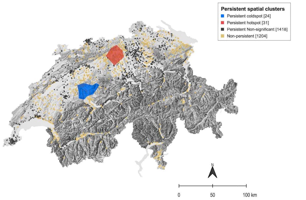 La zone marquée en rouge décrit un hotspot, celle marquée en bleu un coldspot.