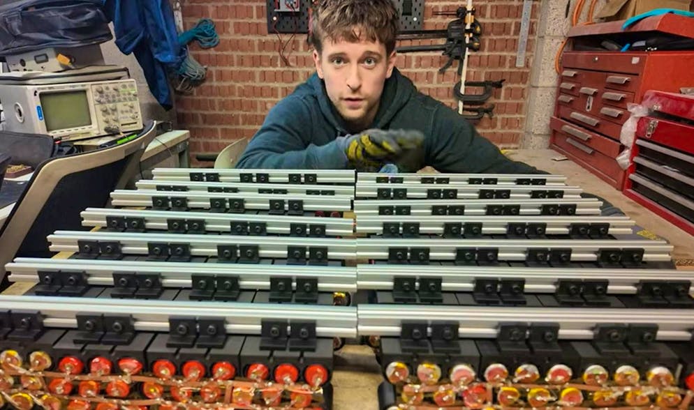 Chris Doel with his self-built battery storage system.
