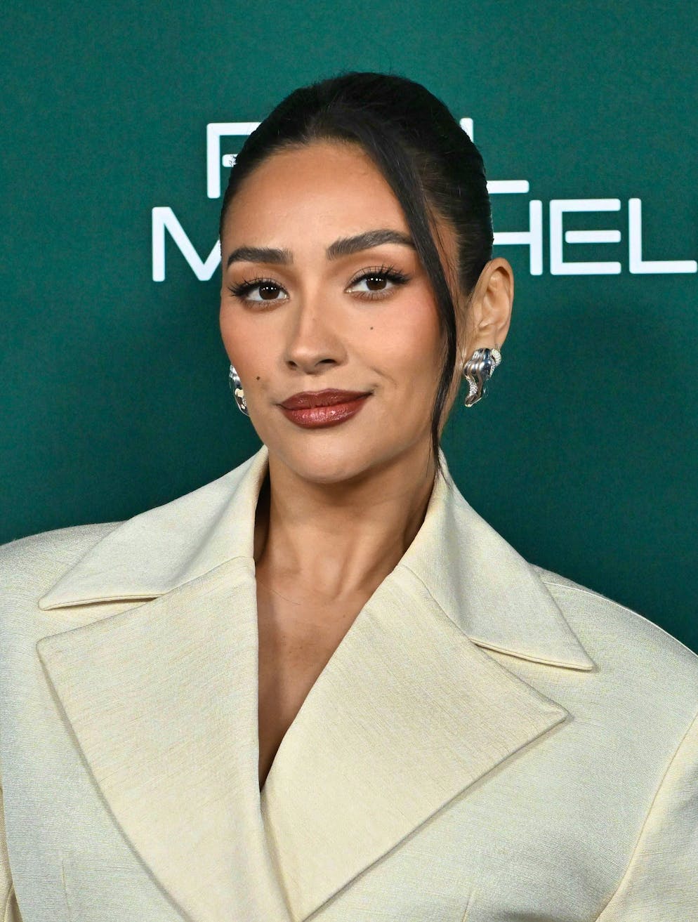 The actress Shay Mitchell. She is best known for the series "Pretty Little Liars".