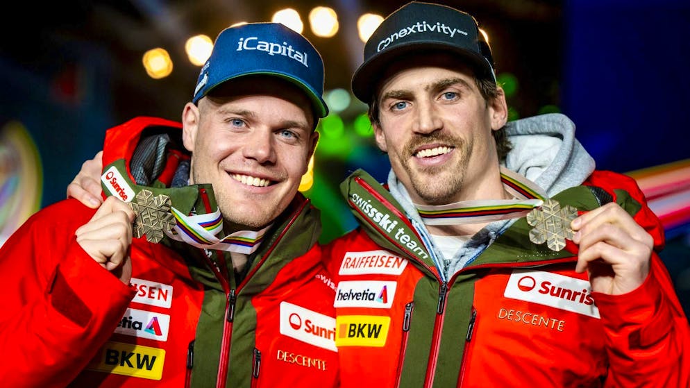 Stefan Rogentin and Marc Rochat pose with their World Championship bronze medals.
