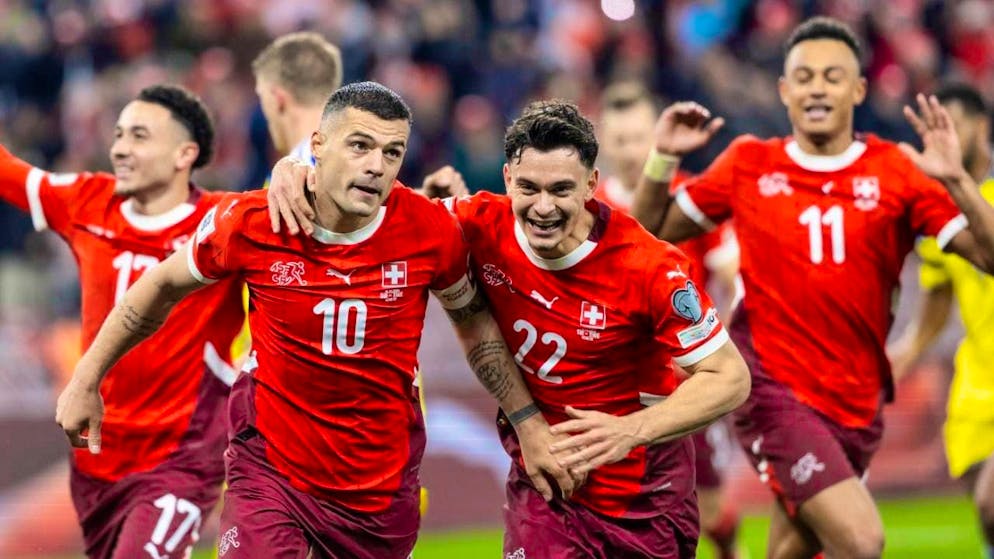 Much joy, but still no Swiss World Cup ticket - Gallery. Captain Granit Xhaka was also in high spirits