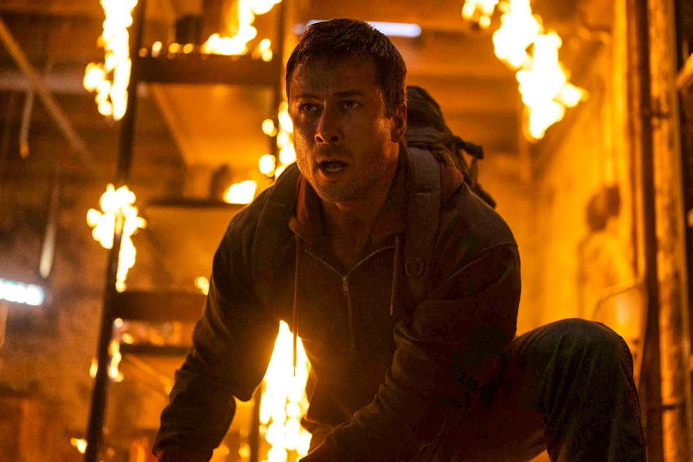 The Running Man. As Ben Richards, he has to run for survival in a TV show.