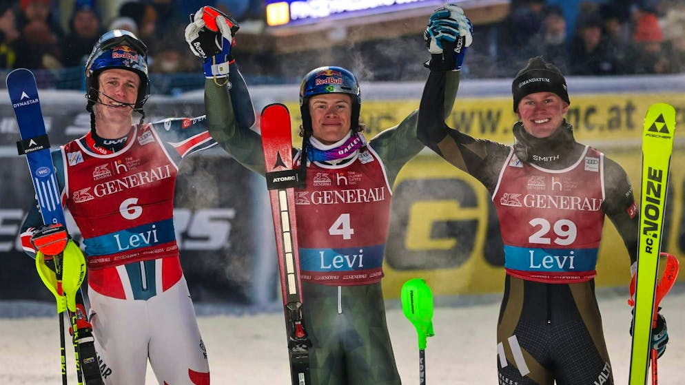 Lucas Braathen (center) wins his first World Cup race for Brazil.