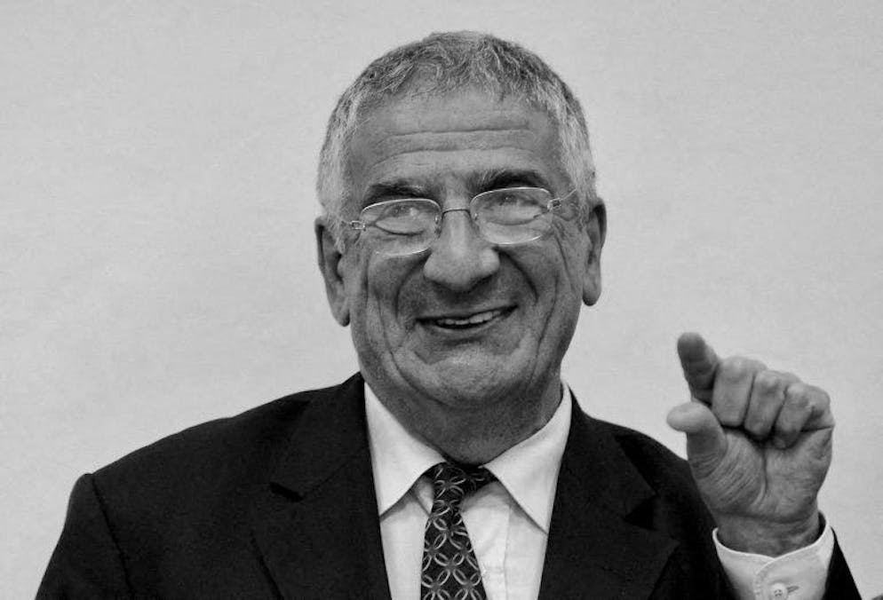 The "SAMU Social de Paris" emergency service president and founder Xavier Emmanuelli (R) speaks after signing a cooperation agreement with the director of the Department of social protection at the Moscow town hall, Vladimir Petrossian, in Moscow, on March 29, 2011. The "SAMU Social de Paris" will assist in the training of Russian social workers who take care of homeless people in the Russian capital and fight against their social exclusion, the agreement said. AFP PHOTO / NATALIA KOLESNIKOVA (Photo by NATALIA KOLESNIKOVA / AFP)