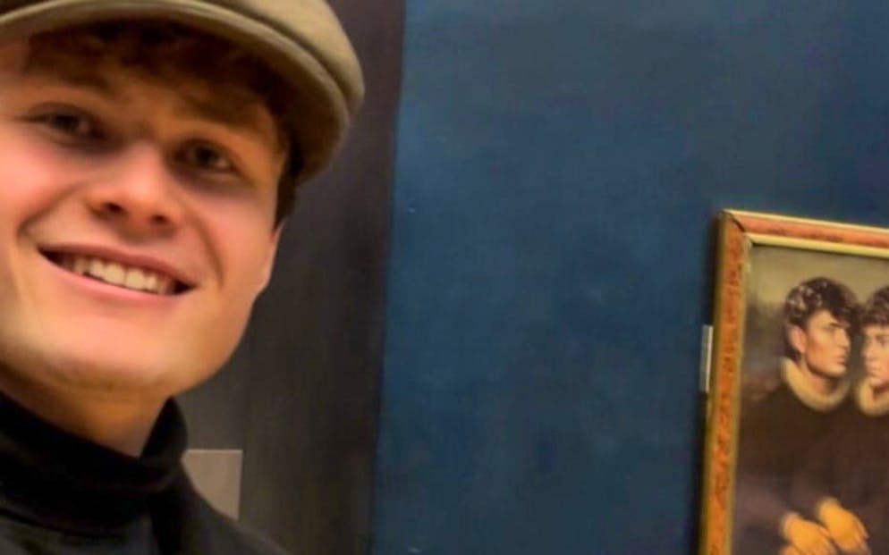 Two young men play a trick on the world-famous Louvre and hang their own picture on the wall.