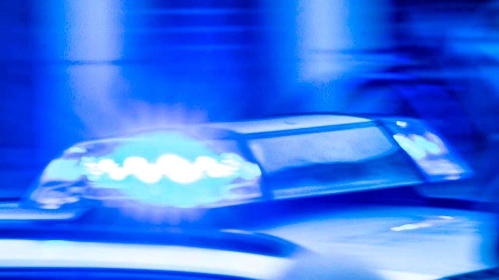 ARCHIVE - A police patrol car is on duty with flashing blue lights. Photo: Jens Büttner/dpa