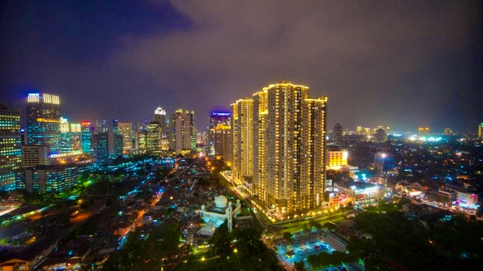 ARCHIVE - Evening view of residential and commercial buildings in Jakarta. Photo: Soeren Stache/dpa/Archive image