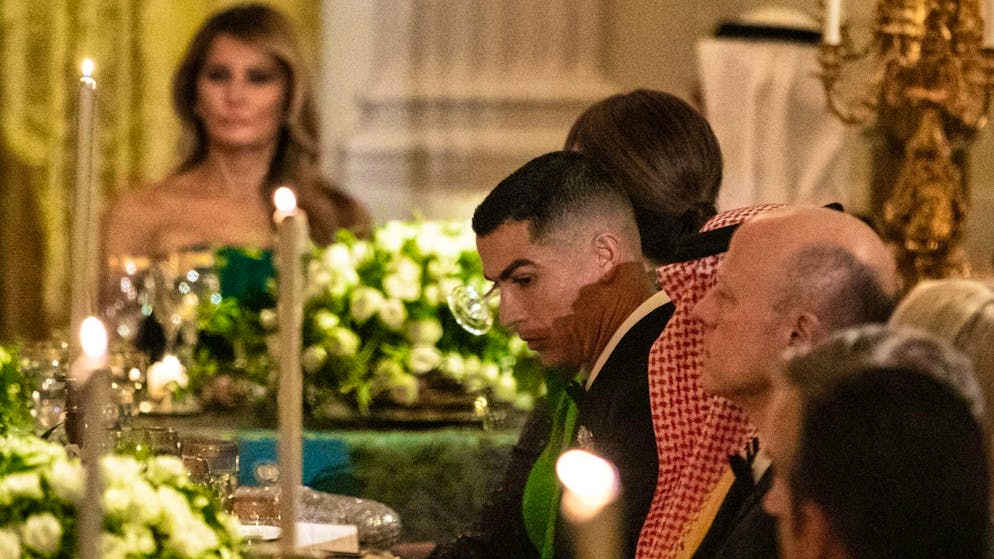 Cristiano Ronaldo listens attentively to what US President Donald Trump says at the gala dinner at the White House during his meeting with Saudi Arabian Crown Prince Mohammed bin Salman.