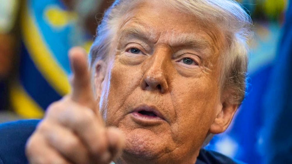 US President Donald Trump answers questions from reporters at the White House. Photo: Evan Vucci/AP/dpa