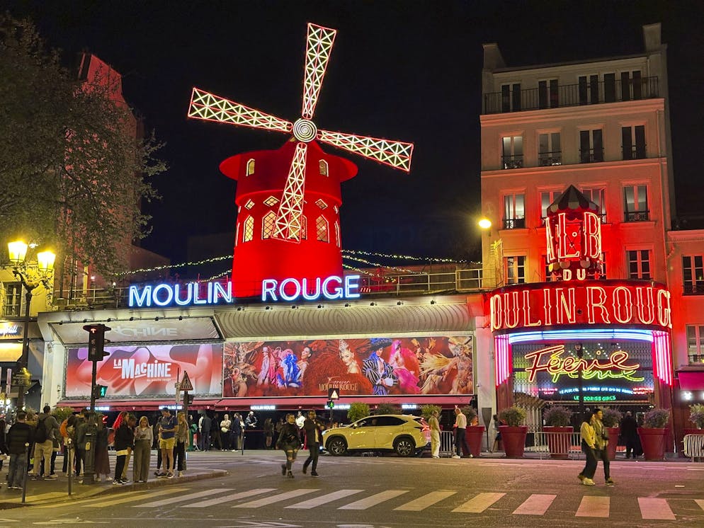 The Moulin Rouge cabaret is seen on April 12, 2024, in the Montmartre section of Paris, France. (AP Photo/Robert F. Bukaty)