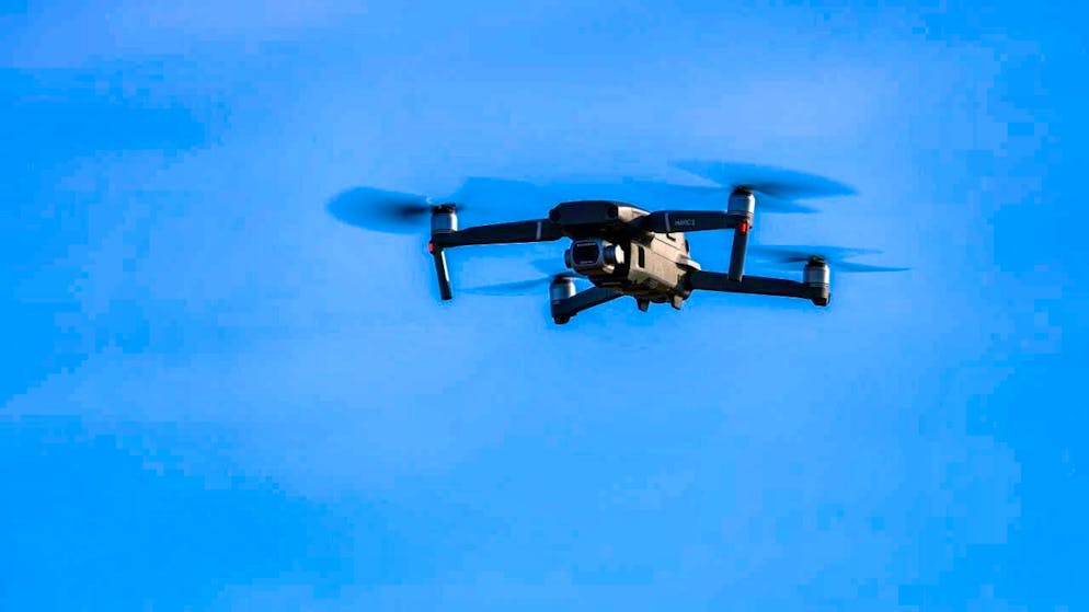 ARCHIVE - A drone flies in the air. Time and again, flight operations have to be temporarily suspended after drone sightings at European airports. Photo: Jan Woitas/dpa