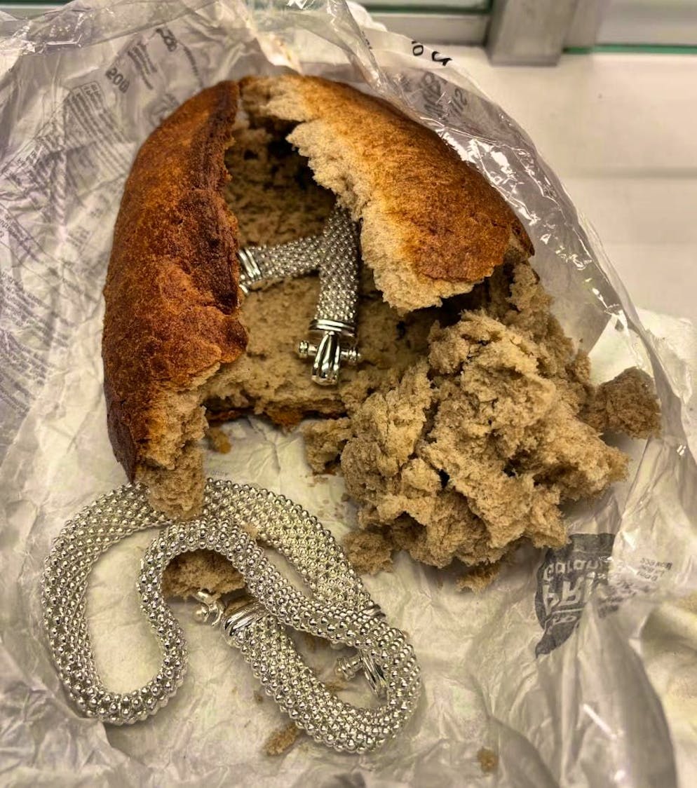 Pieces of jewelry were hidden in a loaf of bread. 