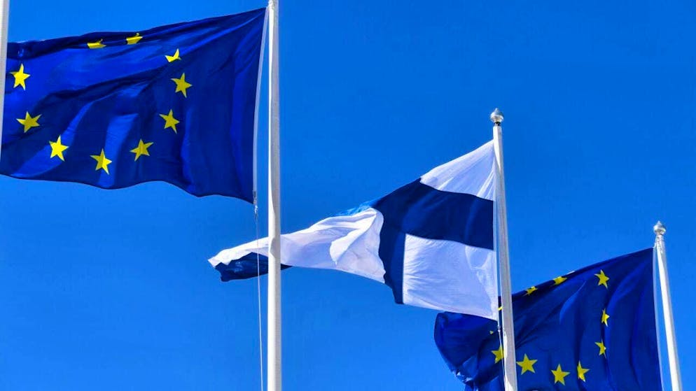 ARCHIVE - Flags of the European Union fly next to a Finnish flag. Photo: Vesa Moilanen/Lehtikuva/dpa