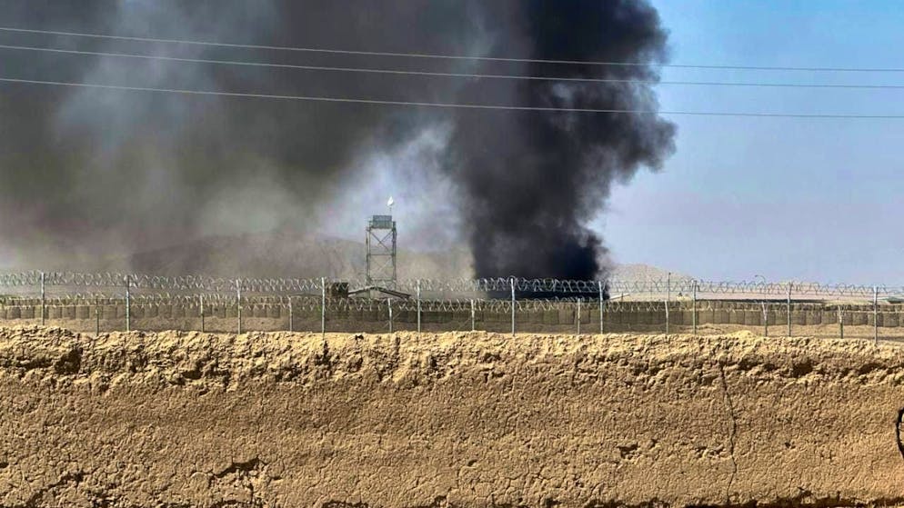 ARCHIVE - Smoke rises after a grenade exploded in a border area during clashes between Pakistani and Afghan forces - taken from the Pakistani side of the border near Chaman. Photo: H. Achakzai/AP/dpa