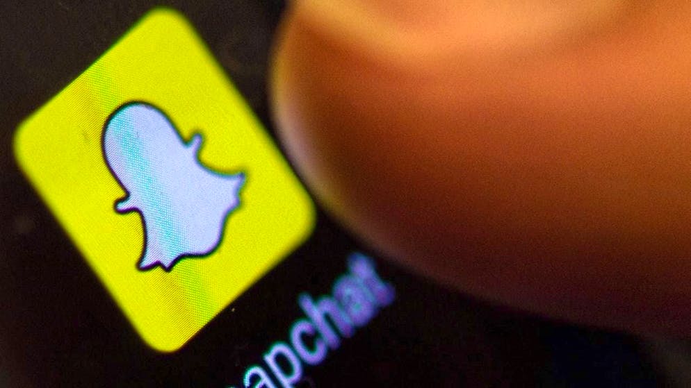 ARCHIVE - The Snapchat icon can be seen on a smartphone. Photo: Patrick Seeger/dpa/Archive