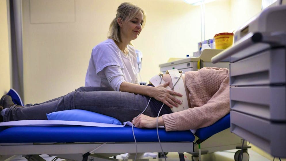 A midwife at work in the women's clinic at Inselspital in Bern.